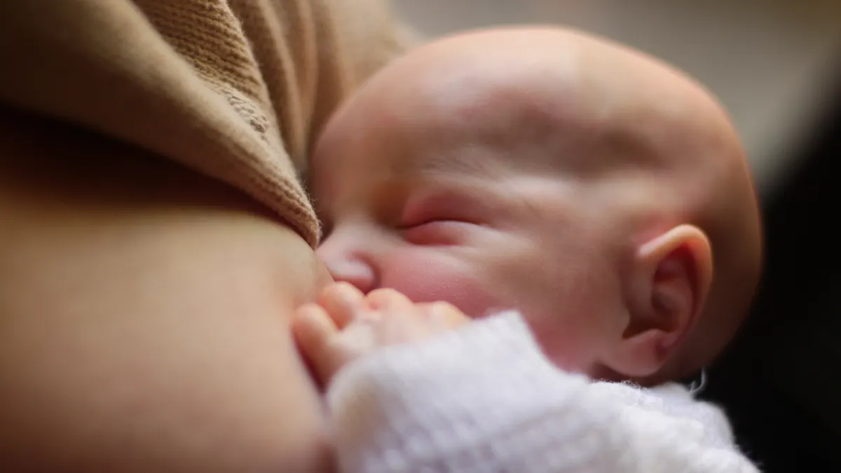 Breastfeeding basics for newborns: what to expect in the first week Close-up of newborn breastfeeding